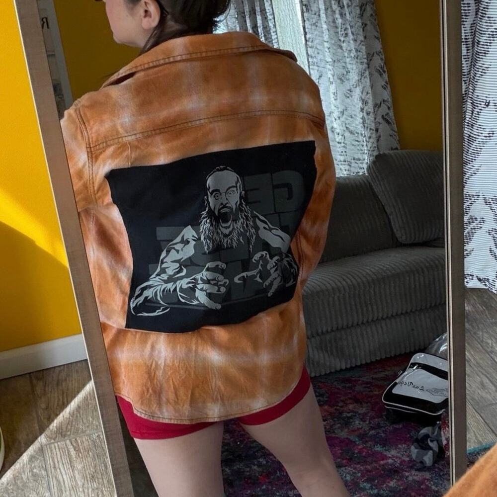 WWE Braun upcycled custom flannel shirt black graphic tee on back bespoke